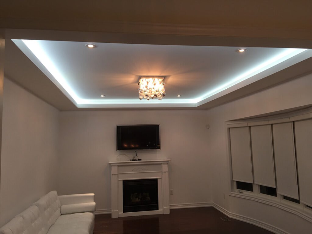 Modernizing a space: Replacing outdated recessed lighting fixtures in a dropped ceiling during a comprehensive renovation project.