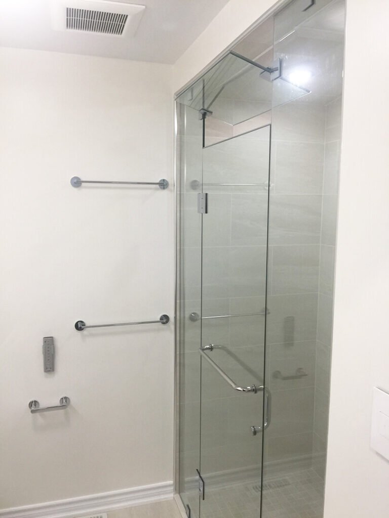 Semi-frameless shower door with chrome hardware